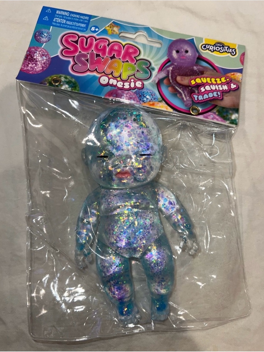 Sugar Swaps Glitter Squishy Onesie Doll - Blue & Purple
